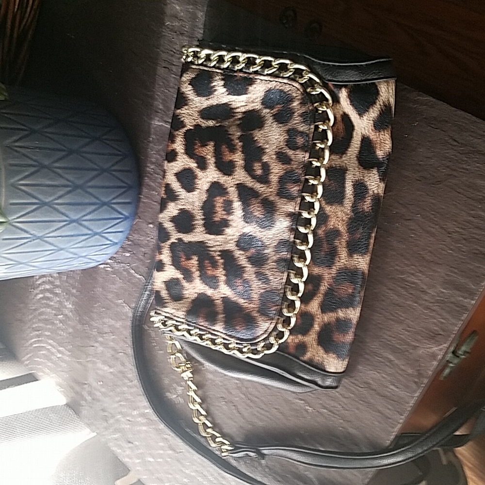 Cross body leopard purse